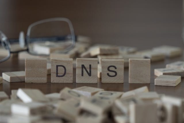 Scrabble letters spelling out DNS