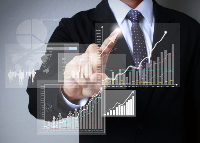 Concept image showing man standing in front of bar graphs and financial charts