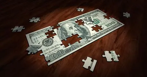 money-puzzle-pixabay-qimono-2500328_480.jpg