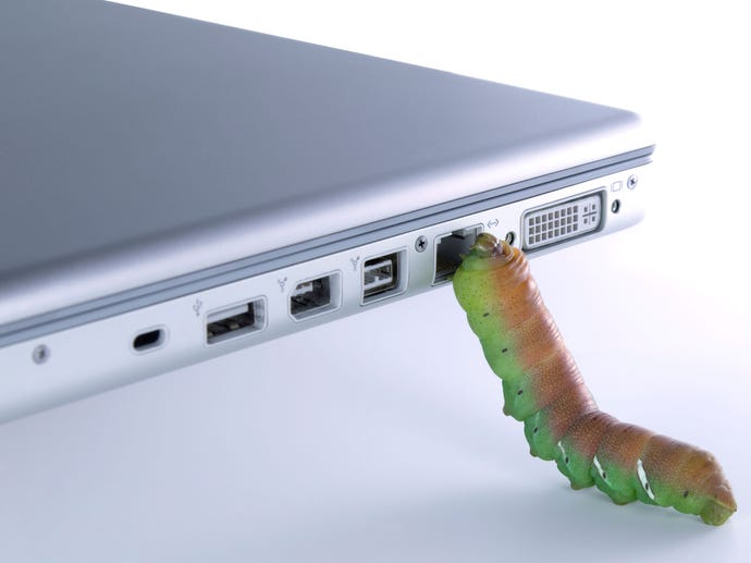 concept art of computer bug with caterpillar crawling into internet port on laptop