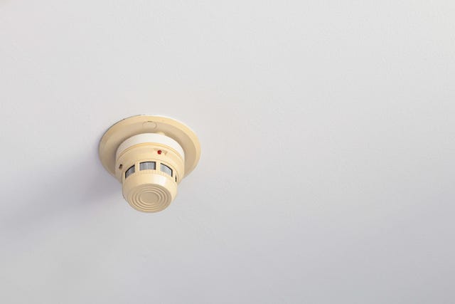 Photo of a smoke alarm mounted on the ceiling. You just know it goes off every time you make toast.