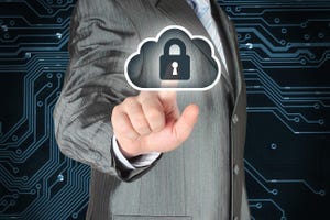 Businessman pushing virtual cloud security button on digital background