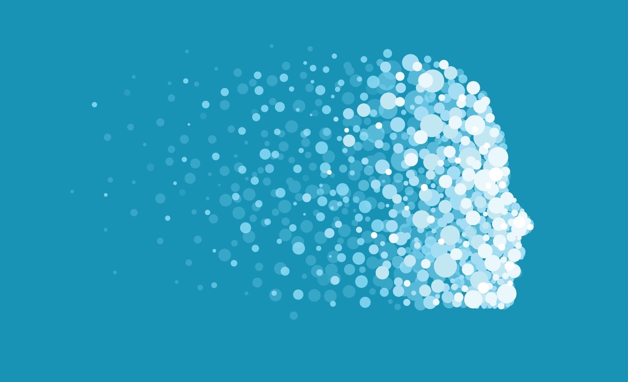 Vector of a human face made of digital particles as symbol of artificial intelligence and machine learning Vector of a human face made of digital particles as symbol of artificial intelligence and machine learning