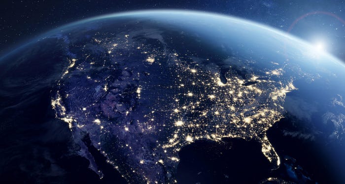 America at night viewed from space with city lights showing activity in United States.