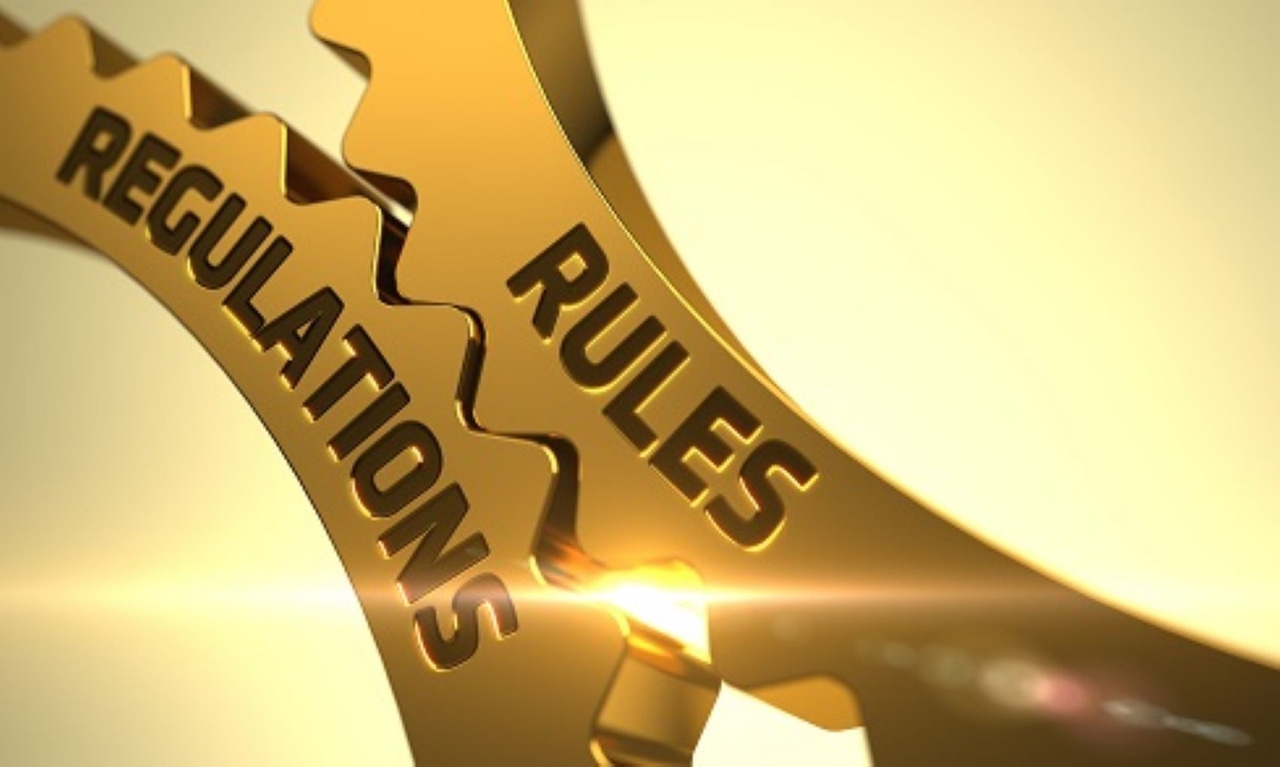 gears with Rules and Regulations written on them gears with Rules and Regulations written on them