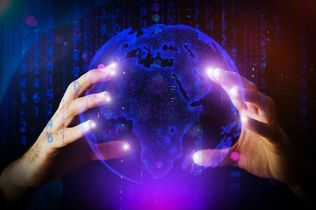 abstract of global software development, hands over a digital globe with coding