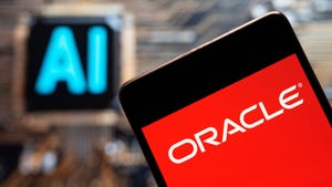 Oracle logo seen displayed on smartphone with artificial intelligence chip and symbol in background.