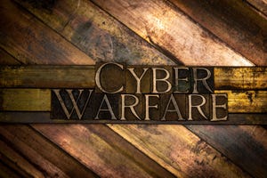 Photo of typeset letters forming Cyber Warfare text on vintage textured grunge copper background