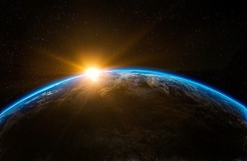 earth shot with sunrise on horizon