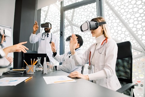 futuristic look at medical professionals using virtual reality goggles