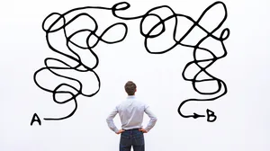 Man examining problem Man examining problem