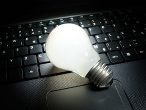 Light bulb that is lit on a computer keyboard