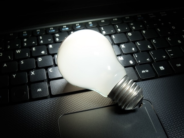 Light bulb that is lit on a computer keyboard