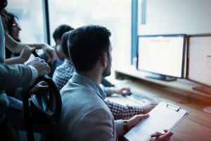 A software development team works together A software development team works together