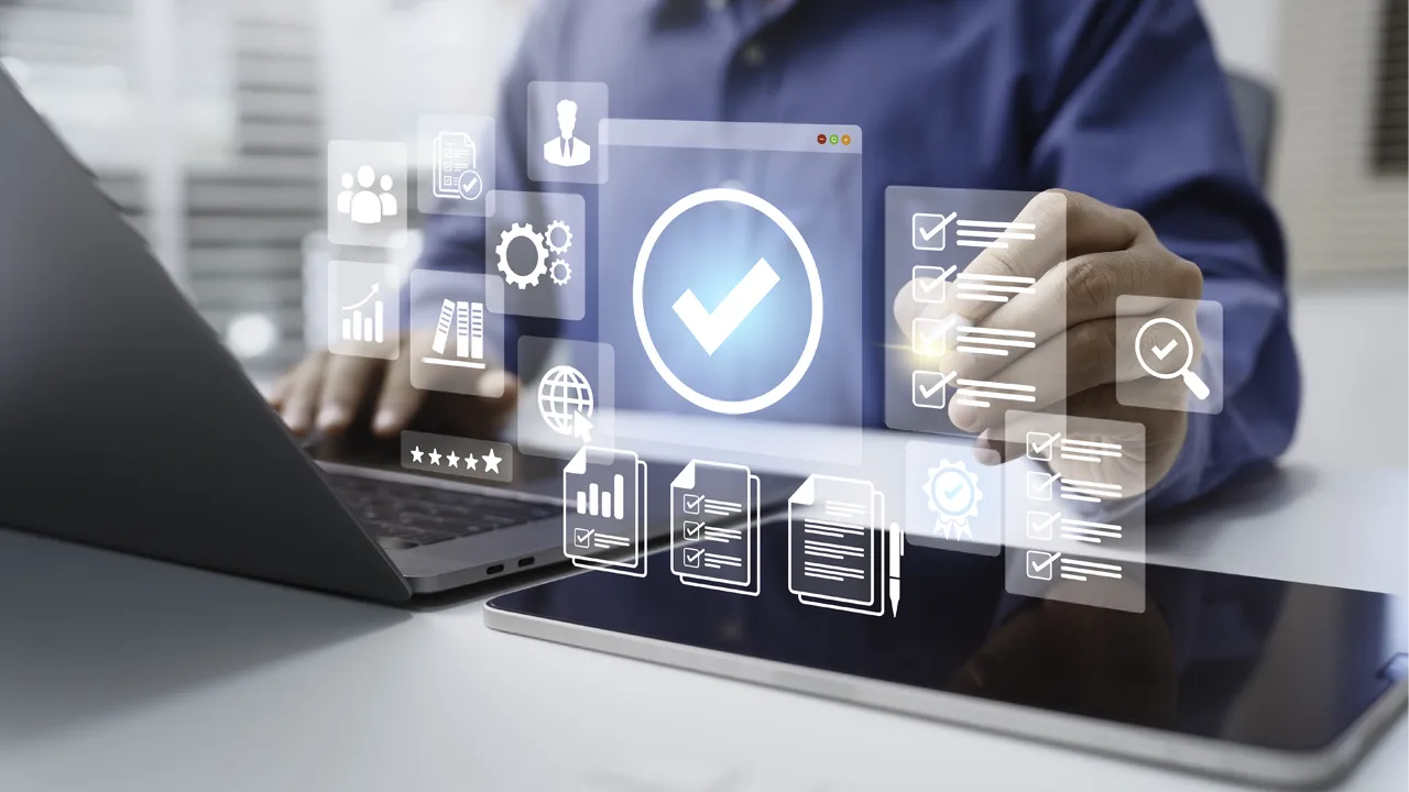 Digital QA-themed icons of a checkmark, five stars and more over a photo of an executive at a laptop Digital QA-themed icons of a checkmark, five stars and more over a photo of an executive at a laptop