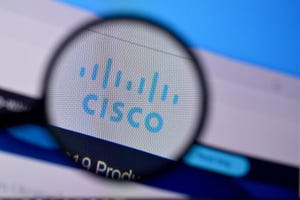 blue Cisco logo beneath a magnifying lens