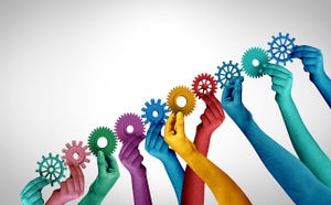 colorful gears with hands moving them upwards