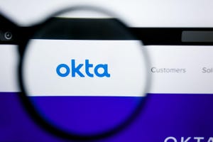 Okta logo visible on display screen.
