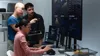 A DevOps team analyzes observability metrics A DevOps team analyzes observability metrics