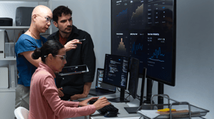 A DevOps team analyzes observability metrics A DevOps team analyzes observability metrics
