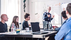 Relaxed, informal IT business startup company team meeting Relaxed, informal IT business startup company team meeting