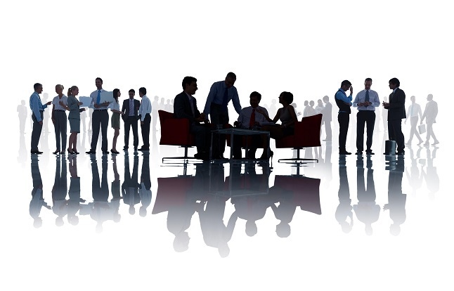 Group of business people discussing in a white background.