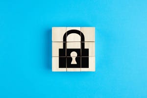 Lock icon on wooden cubes on blue background. Isolation, quarantine or data security concept.