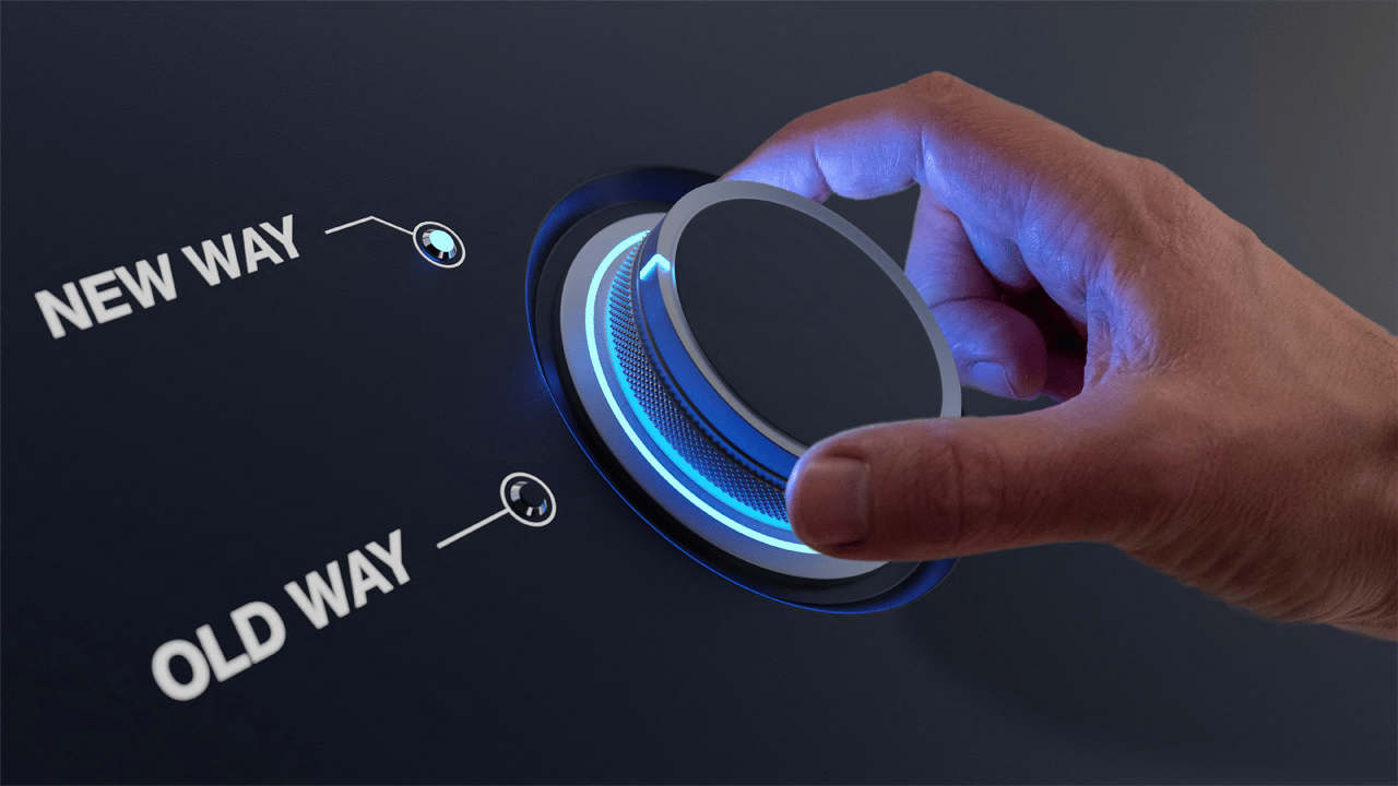 A hand turns a knob with a choice between 'old way' and 'new way' A hand turns a knob with a choice between 'old way' and 'new way'