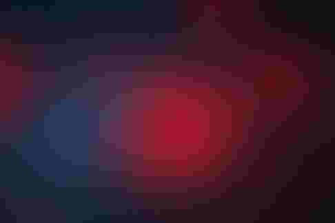 red coronavirus floating in dark blue background