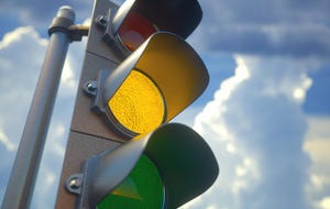 Yellow light illuminated on a traffic light