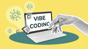 A hand engages with a laptop displaying the words 'vibe coding' on a colorful background with light bulbs A hand engages with a laptop displaying the words 'vibe coding' on a colorful background with light bulbs