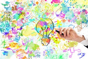 abstract of innovation: drawing on a whiteboard with pastel colors and a lightbulb at center