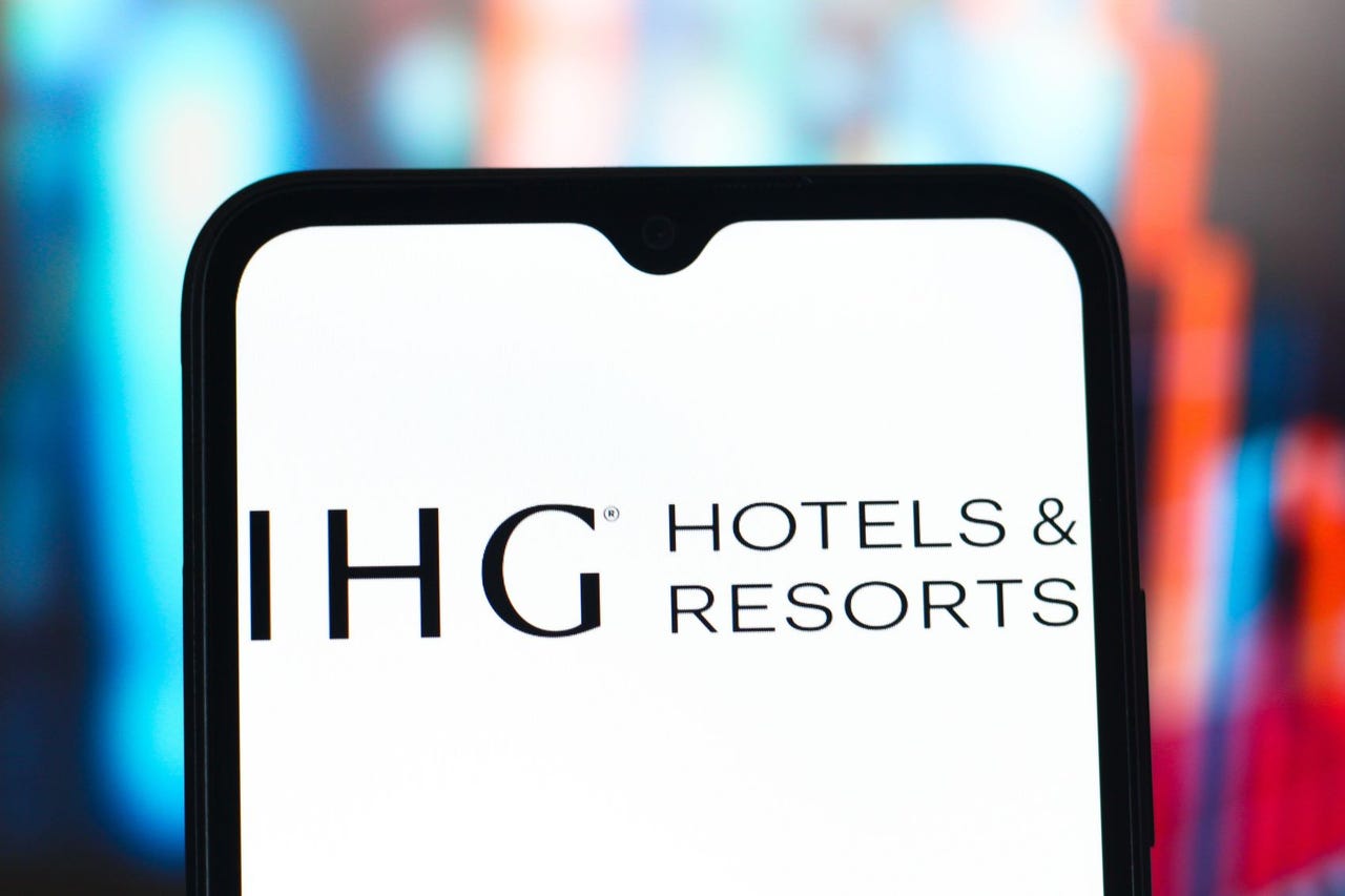 the IHG Hotels & Resorts logo is seen displayed on a smartphone screen the IHG Hotels & Resorts logo is seen displayed on a smartphone screen