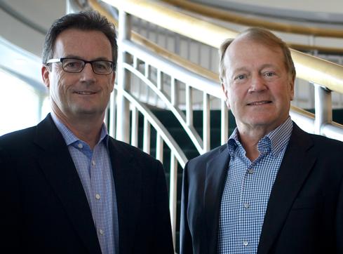 Cisco president Rob Lloyd, left, and CEO John Chambers, right