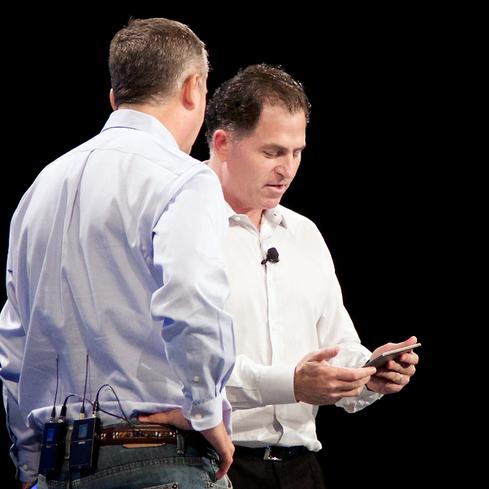 Dell CEO Michael Dell (right) and Intel CEO Brian Krzanich check out Dell's Venue 8 7000 tablet.