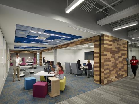 Capital One workspaces are designed to drive innovation and enable associates to work the way they work best. This meet-up space on the company's Virginia campus is designed with modern tech teams in mind, with reconfigurable furniture, integrated whiteboards, and content-sharing technology.
(Image: Capital One)
