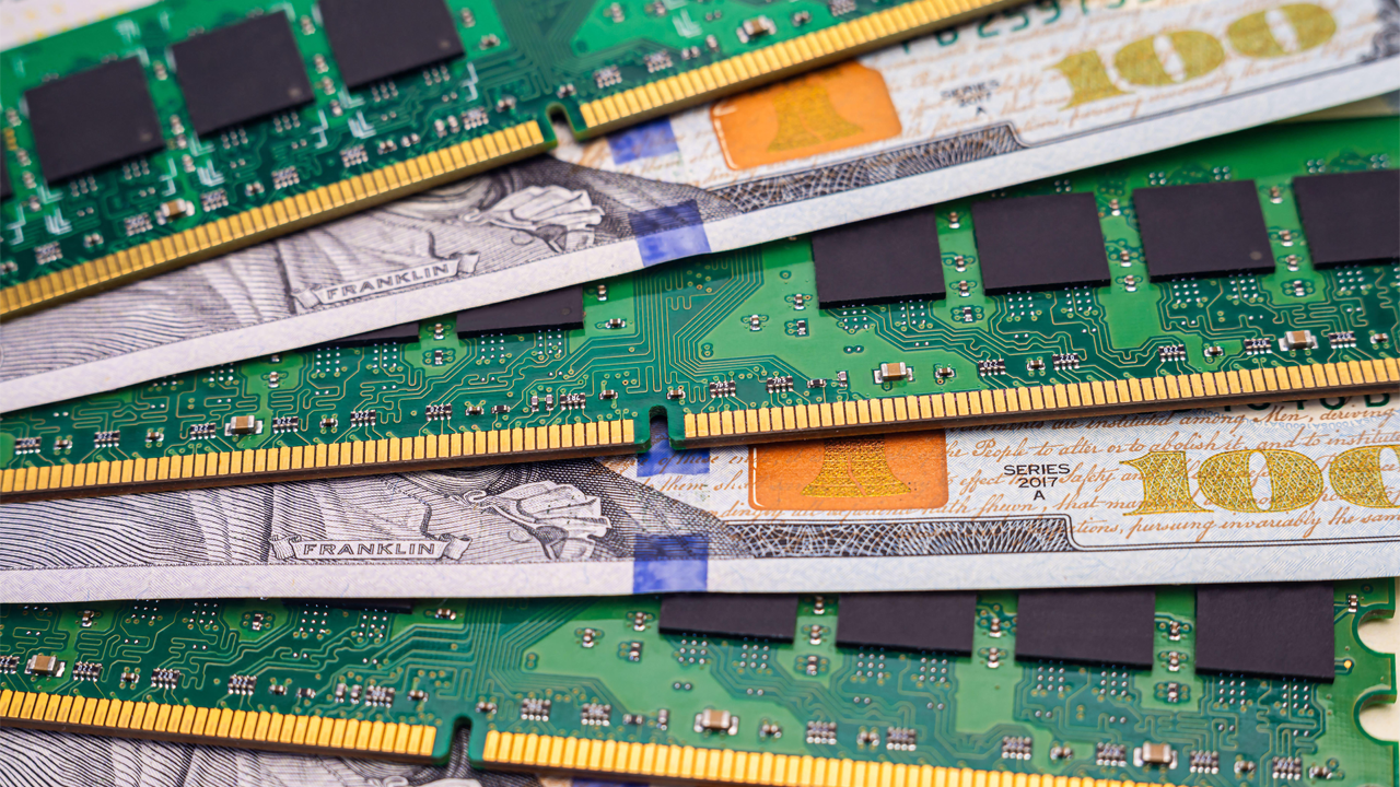 New memory chips are arranged on hundred dollar bills.