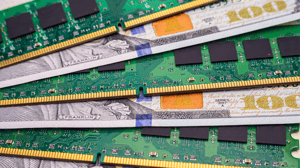 New memory chips are arranged on hundred dollar bills. New memory chips are arranged on hundred dollar bills.