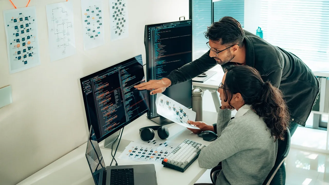 Two developers at computers Two developers at computers