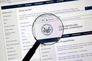 magnifying glass on an SEC document