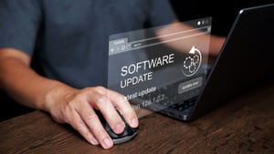 Man working and installing business program updates on computer. Man working and installing business program updates on computer.