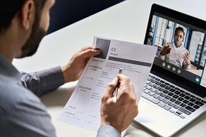 recruiter interviewing a job candidate by video conference