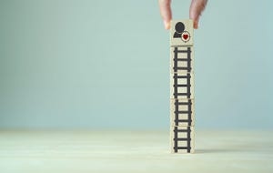 blocks in form of a ladder leading to happy customer success