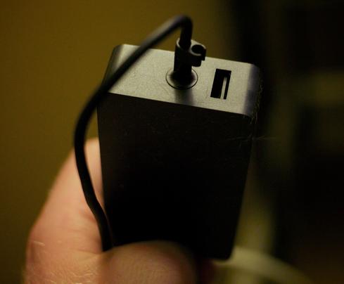 Microsoft included an extra USB slot on the Surface Pro 3's charger. 