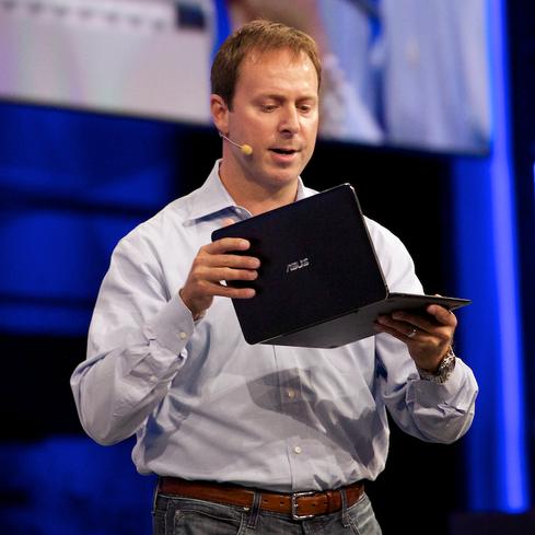 Intel PC Client Group GM Kirk Skaugen handles an Asus tabletthat will use Core M.