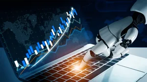 A robotic hand engaged with a laptop, illustrating stock market trends through data visualizations A robotic hand engaged with a laptop, illustrating stock market trends through data visualizations