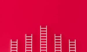 ladders against a red background