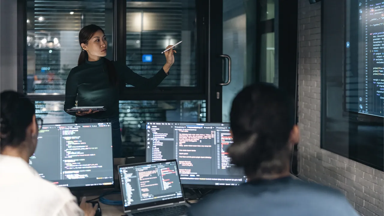 Software developer team working together Software developer team working together