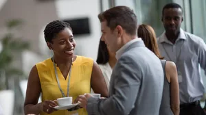 Business executives meeting at a networking event Business executives meeting at a networking event