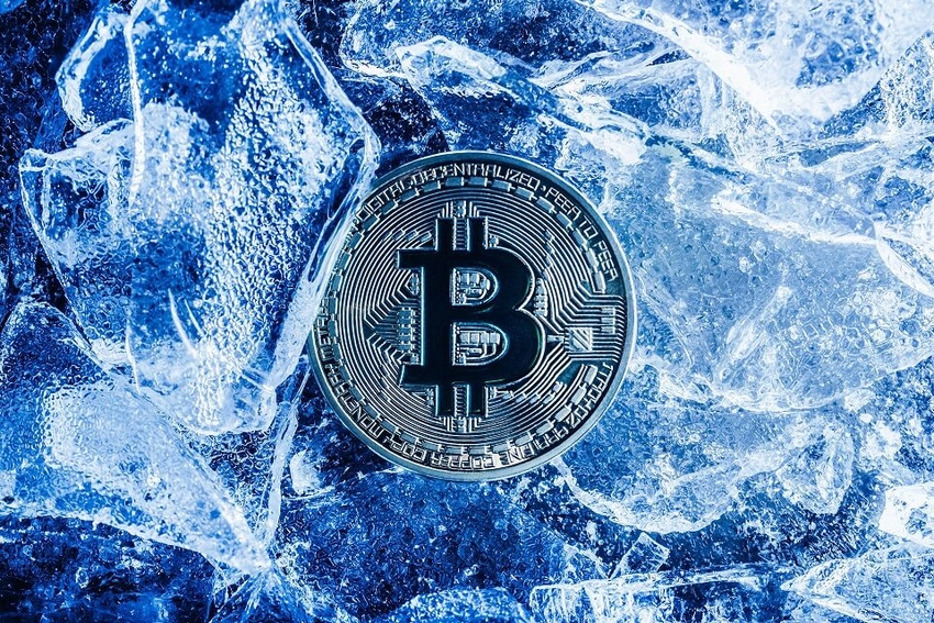 abstract of bitcoin symbol in an icy setting